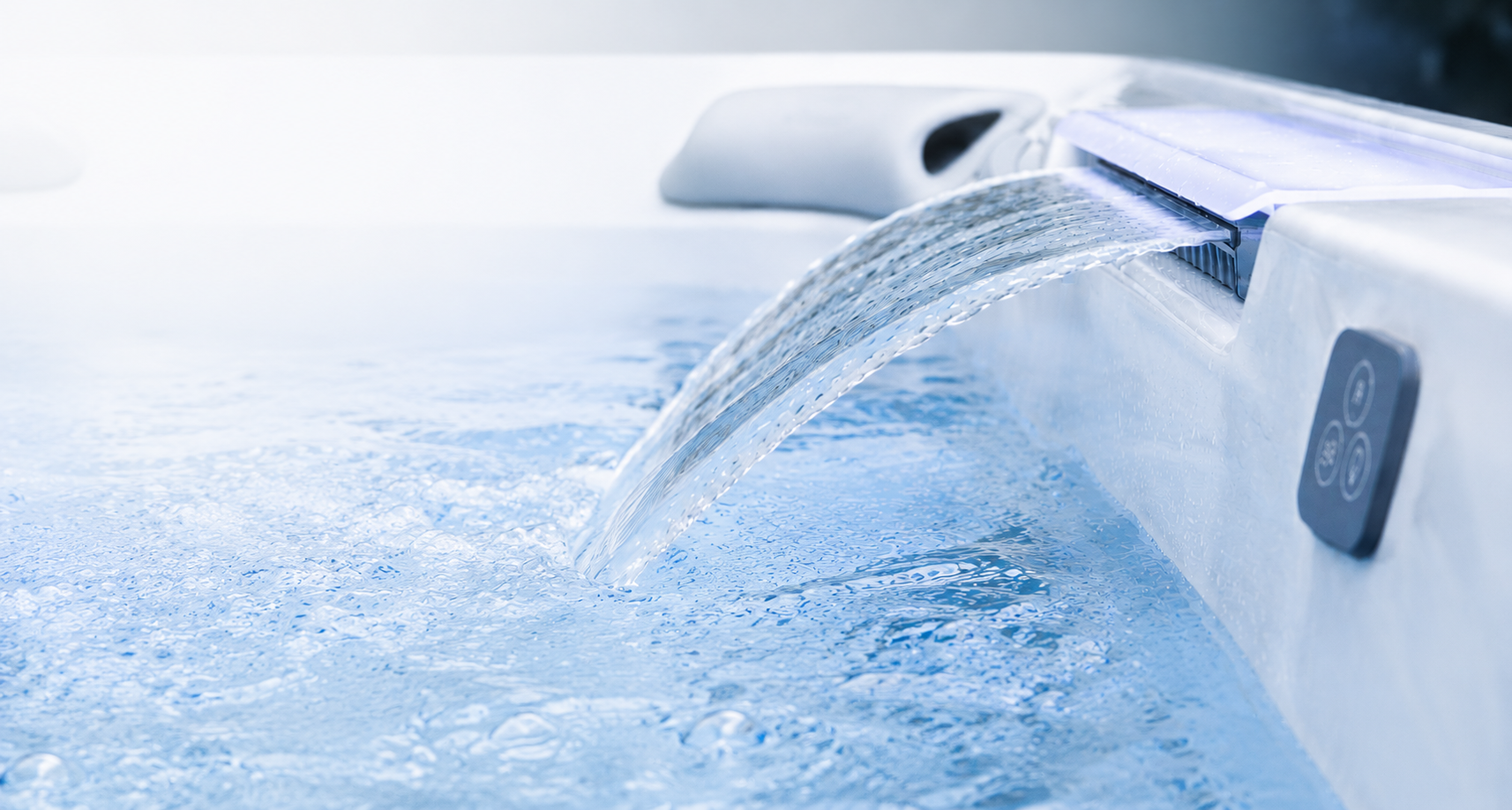 Crystal-clear spa water with built-in waterfall feature